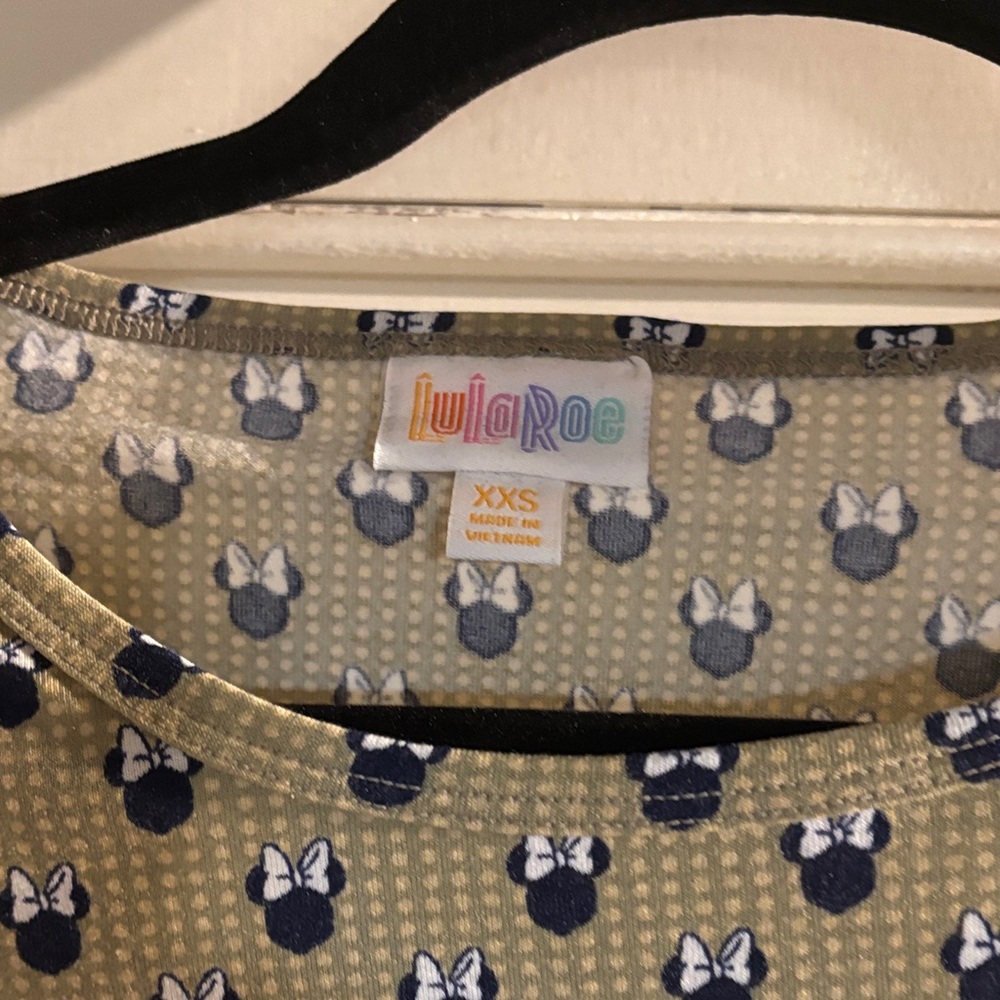 Lula Roe Disney
Patterned Short Sleeve Top - Picture 5 of 6